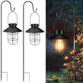 pearlstar 2 Pack Solar Lights Outdoor, Hanging Solar Lanterns with Edison Bulb and 2 x 32 Inch Shepherd Hooks, Waterproof Landscape Lighting for Garden Patio Yard Pathway Driveway Lawn (Black) - style: Black Lanterns