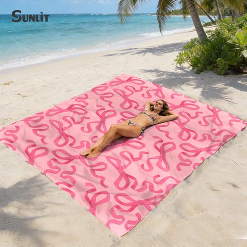 Sunlit Large Beach Blanket Waterproof Sand Proof, 81" x106" Sand Free Beach Mat Anchored Pockets and Storage Bag, for Travel Beach Camping Outdoor Festival, Coquette Pink Bow