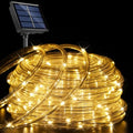 YEGUO Solar Rope Lights Outdoor Waterproof, 66ft 200 LED Warm White String Lights, 8 Modes Fairy Lights in Clear Thin Tube - color: Warm White