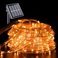YEGUO Orange Solar Halloween Lights, 66ft 200 LED Solar Rope Lights Outdoor Waterproof, 8 Modes Fairy Lights in Clear Thin Tube - color: Orange